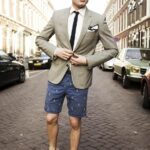 The trend for the summer of 2025 is to wear shorts with blazers.